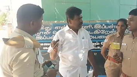 Former DMK MLA P Kamaraj confronted the police personnel over the use of a whistle, symbol of TVK, inside the polling station at Krishnarayapuram in Karur, leading to a brief verbal altercation.