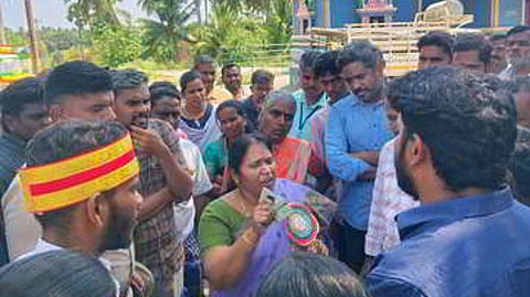 District revenue officer R Kavitha holds peace talks with boycotting voters at K Echambadi.
