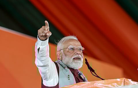 Prime Minister Narendra Modi speaks during a campaign for the West Bengal Assembly elections, in Krishnanagar, Nadia district.
