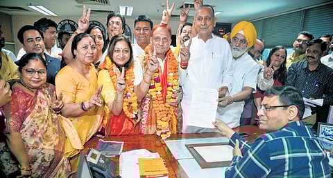 Candidates of the BJP during nomination filing on Thursday
