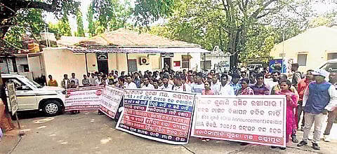 Villagers staging protest at the Koraput collectorate on Thursday