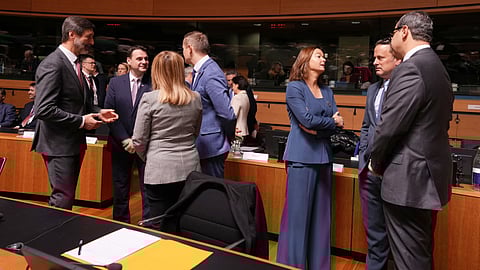 Slovenia's Foreign Minister Tanja Fajon, third right, speaks with Cypriot Foreign Minister Constantinos Kombos, right, and Luxembourg's Foreign Minister Xavier Bettel, second right, during a meeting of EU foreign ministers at the European Council building in Luxembourg, Tuesday, April 21, 2026.