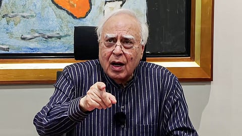 Rajya Sabha MP Kapil Sibal speaks during a press conference in New Delhi.