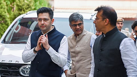 Rajya Sabha MPs Raghav Chadha, Sandeep Pathak and Ashok Mittal arrive to meet BJP National President Nitin Nabin at the party headquarters, in New Delhi on Friday.