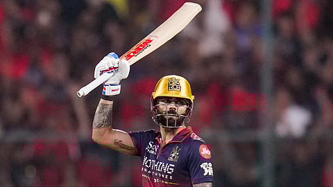 RCB's Virat Kohli celebrates his half century during an IPL 2026 T20 cricket match between Royal Challengers Bengaluru and Gujarat Titans, in Bengaluru, Karnataka, Friday, April 24, 2026.
