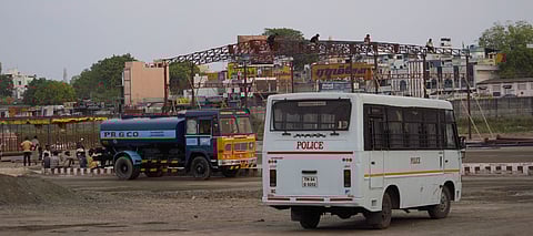 The HR&CE department installing a decorated, temporary resting station on the Vaigai riverbed for the Kallazhagar river entry on May 1