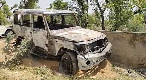 The car used by the abductors was later set on fire by an angry mob, leaving it gutted.