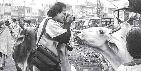 Raghu Rai takes a picture on a winter morning in Old Delhi on January 11, 1992