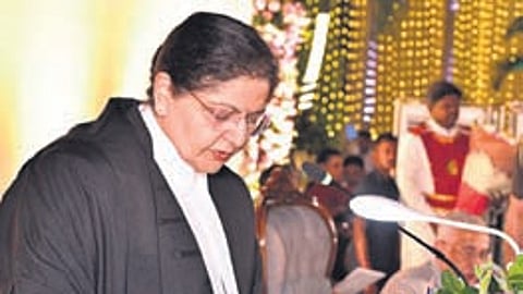 Governor S Abdul Nazeer administers the oath of office to Lisa Gill as the Chief Justice of AP High Court