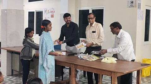 The trust donates 100 copies of the Bhagavad Gita to students learning yoga and pursuing spiritual education in Dharmapuri