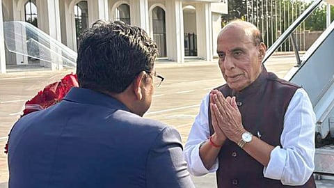 Defence Minister Rajnath Singh, right, being welcomed by Ambassador of India to the Kyrgyz Republic Birender Singh Yadav upon arrival at Manas International Airport to attend the SCO Member States Defence Ministers meeting, in Bishkek, Kyrgyz Republic.