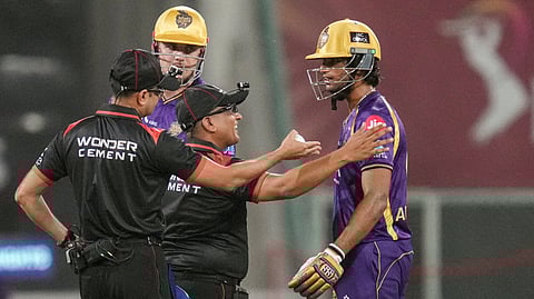 KKR's Tim Seifert and Angkrish Raghuvanshi wait for the third umpire's decision during the IPL 2026 T20 cricket match between Lucknow Super Giants and Kolkata Knight Riders, in Lucknow, Uttar Pradesh, Sunday, April 26, 2026.