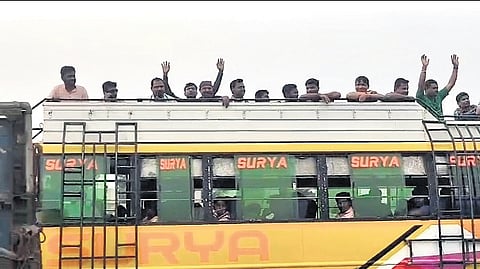 Migrant Bengali voters working in Jagatsinghpur on way home in a bus.