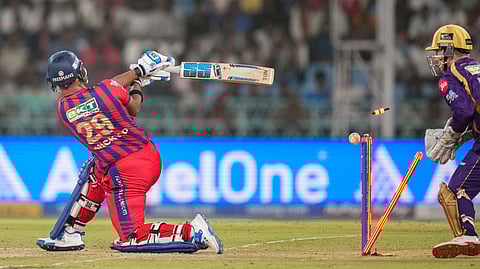 LSG's Nicholas Pooran gets bowled by Kolkata Knight Riders' Sunil Narine during super over in the IPL 2026 T20 cricket match between LSG and KKR, in Lucknow, Uttar Pradesh, Sunday, April 26, 2026.