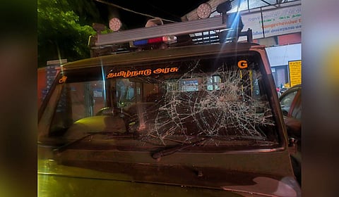 Protesters damaged the windshield of a forest department vehicle at O-Valley in Gudalur forest division on Saturday night.