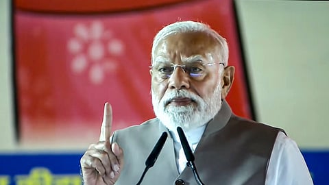 Prime Minister Narendra Modi addresses the Mahila Sammelan, in Varanasi.
