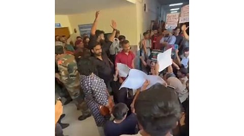 More than 50 students gathered outside the venue in a peaceful demonstration, raising slogans against the presence of the Rashtriya Swayamsevak Sangh (RSS) on campus.