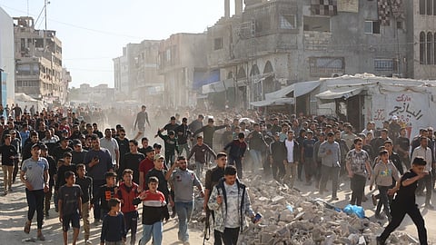 Displaced Palestinians attend the funeral after four people were killed by an Israeli strike that targeted a vehicle in Gaza City, on April 28, 2026.