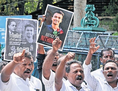 Activists protesting in front of the Secretariat on Tuesday as part of the hartal called by various Dalit organisations, demanding justice for Nithin Raj