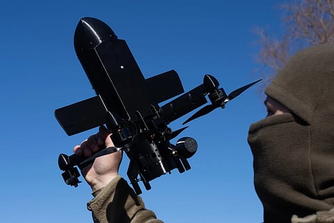 An instructor from the Ukrainian company General Cherry demonstrates the operation of an anti-air interceptor drone designed to destroy Russian attack drones in Kyiv region, on March 11, 2026.