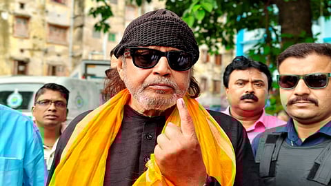 BJP leader Mithun Chakraborty shows his ink-marked finger after casting his vote during the second phase of the West Bengal Assembly elections in Kolkata, Wednesday, April 29, 2026.
