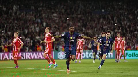 PSG's Ousmane Dembele celebrates after scoring his side's third goal during a Champions League semifinal, first leg, soccer match between Paris Saint-Germain and Bayern Munich in Paris, Tuesday, April 28, 2026.
