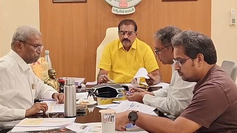 Water Resources Minister Nimmala Ramanaidu reviews the progress of irrigation projects in North Andhra at his camp office on Tuesday.