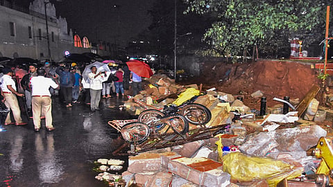Police personnel at the site after a wall collapse following heavy rain, at Bowring Hospital, in Bengaluru, Wednesday, April 29, 2026. At least seven people were reported dead.
