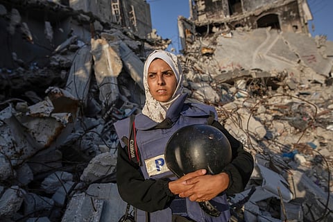 Freelance journalist Mariam Dagga, 33, who had been working with the Associated Press and other outlets during the Gaza war, poses for a portrait in Khan Younis, southern Gaza Strip, on June 14, 2024.