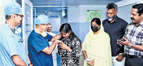 Amana with doctors and parents at Lisie Hospital, Kochi