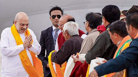 Union Home Minister Amit Shah being received by Ladakh LG Vinai Kumar Saxena and others upon his arrival at the airport for a two-day visit, in Leh.