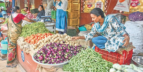 A vegetable market in Vijayawada with few buyers on Thursday
