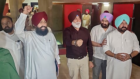 Congress leaders raise slogans in protest as they demand an alcohol test on Punjab Chief Minister Bhagwant Mann during a state assembly special session in Chandigarh, Friday, May 1, 2026.