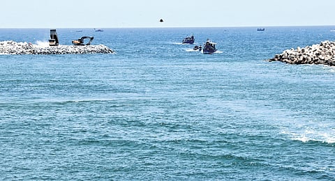 Reconstruction work progressing at Perumathura-Muthalapozhi harbour mouth in Thiruvananthapuram on Saturday.