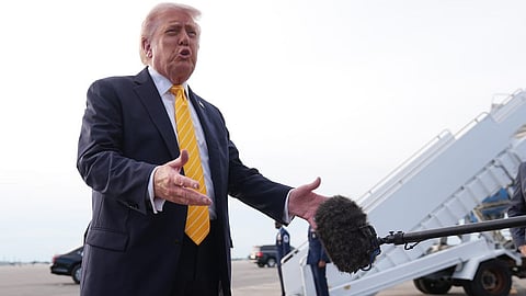 President Donald Trump talks to reporters before he boards Air Force One at Palm Beach International Airport in West Palm Beach, Fla., Saturday May 2, 2026, en route Miami.