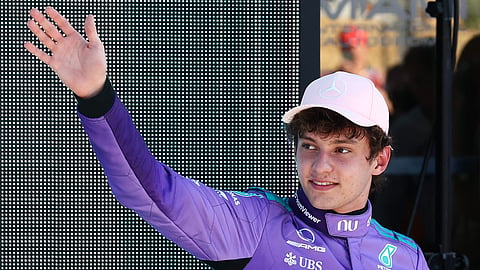 Mercedes' Italian driver Kimi Antonelli waves after winning the pole position during the qualifying session for the 2026 Miami Formula One Grand Prix at Miami International Autodrome in Miami Gardens, Florida, on May 2, 2026.