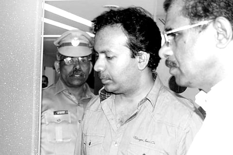 Man held for money-chain fraud 