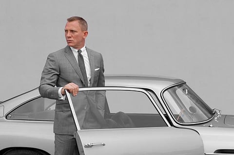 Daniel Craig takes driving lessons