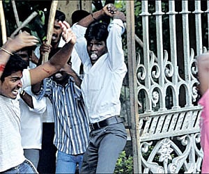 A student of Dr Ambedkar Law College being attacked by his collegemates during a group clash in Chennai on Wedesday.