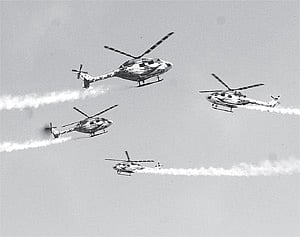 Aerobatics by Sarang choppers a week ahead of President Pratibha Patil's visit to the Air Force Technical College, Jalahalli Air Force Station.