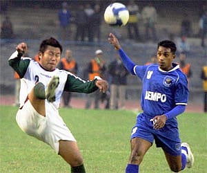 Kolkata Dempo Sporst Club blue and McDowell Mohun Bagan in action during 30th Federation Cup Final Match in Kolkata on Sunday. PTI