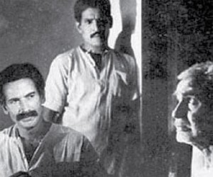A scene from Utharayanam with Balan K Nair and Premji.