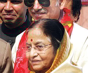 President Pratibha Patil with Puri King Gajapati Dibyasingh Deb near Jagannath Temple in Puri on Wednesday.