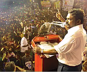 Viduthalai Chiruthaigal Katchi leader Thirumavalavan addressing a public meeting organised to celebrate his birthday, in the city on Monday.