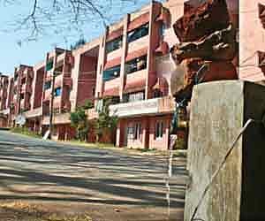 A view of Rajiv Nagar Government Quarters, Melarannoor, which has been reeling under water shortage, against the backdrop of a faulty public tap.