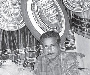 Surendran giving final touches to the headgear