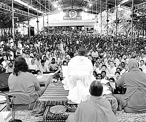 Mata Amritanandamayi delivering a devotional lecture at the Mata Amritanandamayi Math at Puthur, Palakkad, on Monday.