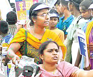 Differently-abled form human chain on Marina