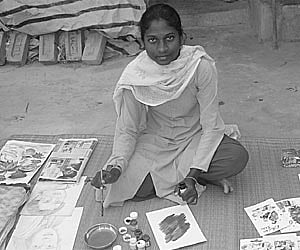 She defies disability with painting brush