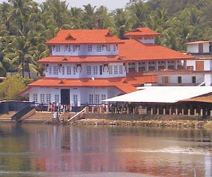 A view of the Parassinikadavu temple from the Valapattinam bridge.